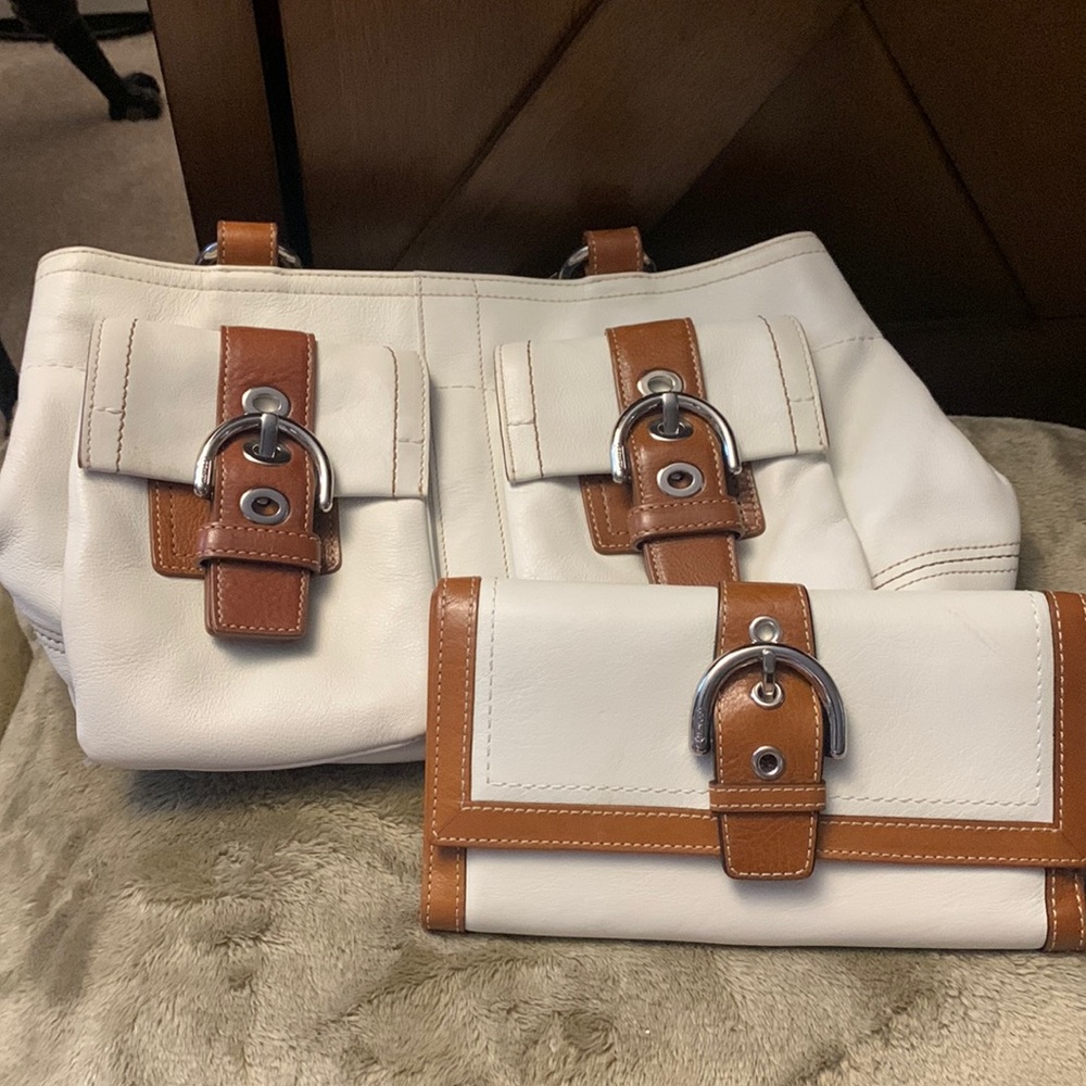 Gently used matching Coach shoulder bag and wallet.